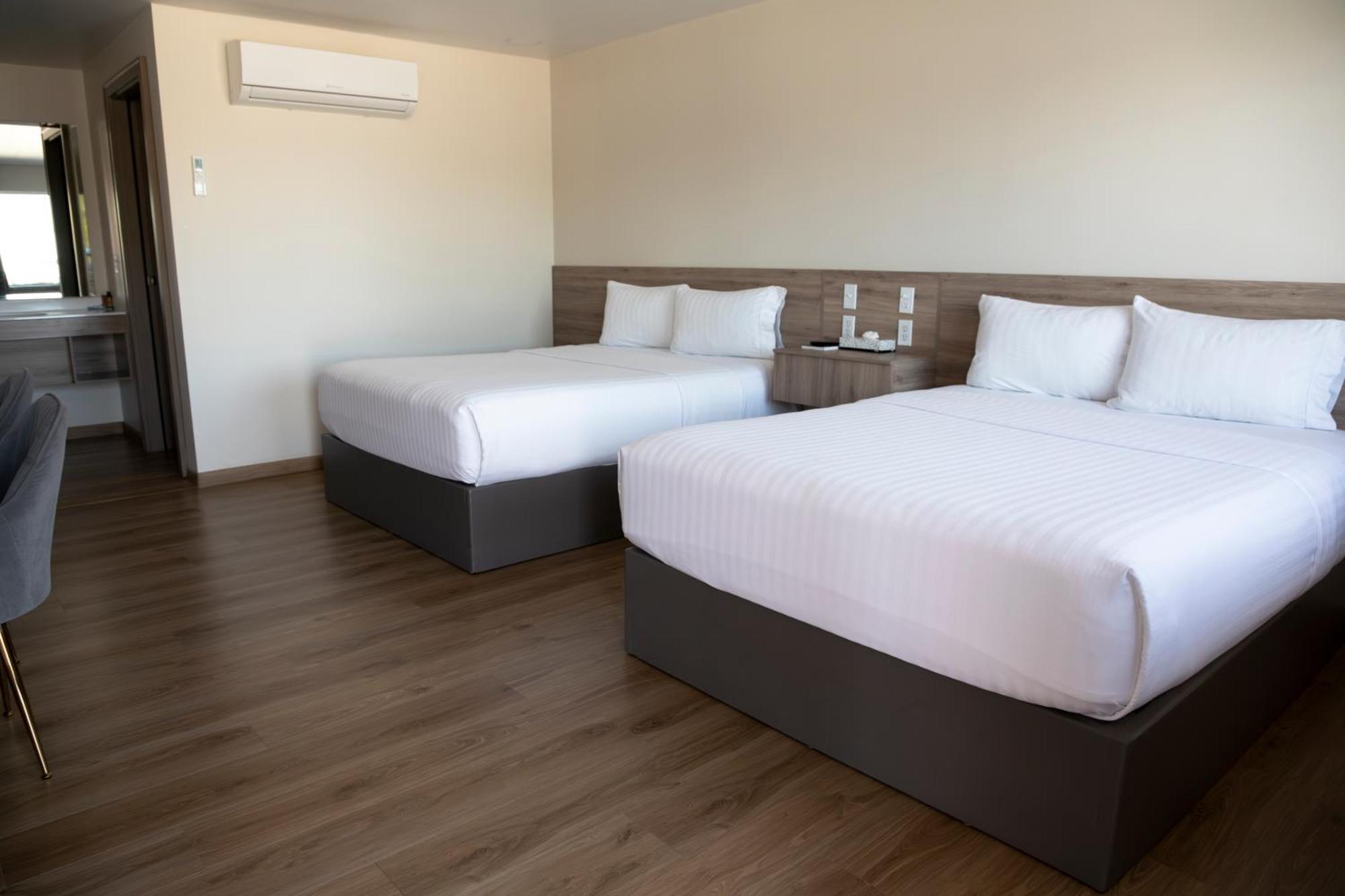 La Huerta Inn & Suites Cuauhtémoc エクステリア 写真